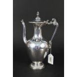 A Victorian silver coffee pot with engraved mark and swag decoration on flared base,
