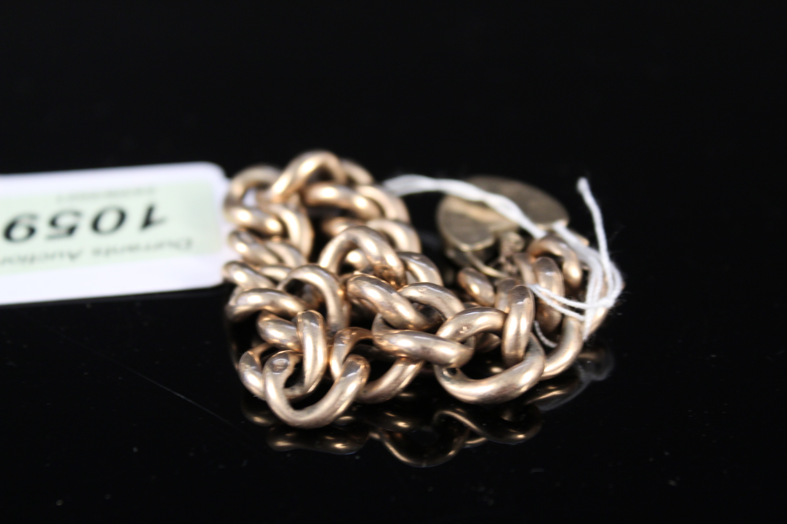 A 9ct gold curb link bracelet (as found) with heart shaped padlock clasp, - Image 3 of 3
