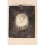 A framed hand painted picture miniature of a lady in an Elizabethan style ruff, possibly on ivory,