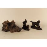 An interesting cast resin boars head resembling carved wood,