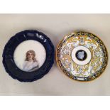 A Minton Majolica plate on a yellow ground with central Grecian style portrait head,