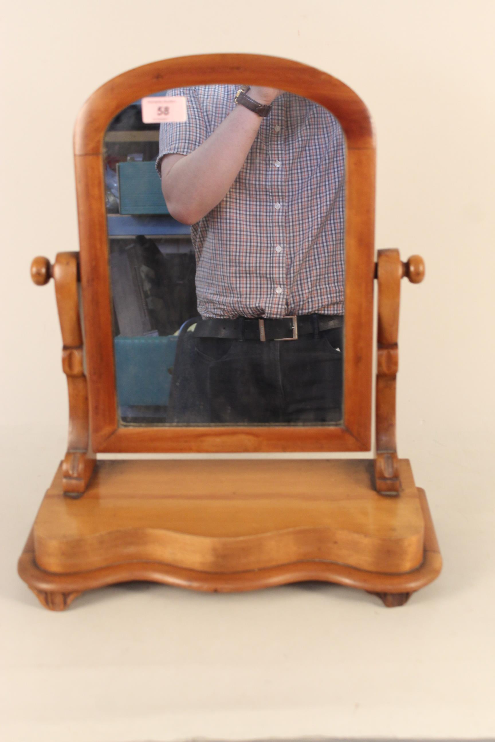 A Victorian satin birch toilet mirror