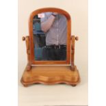 A Victorian satin birch toilet mirror