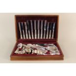 A wooden cased canteen of Viners silver plated Kings pattern cutlery,