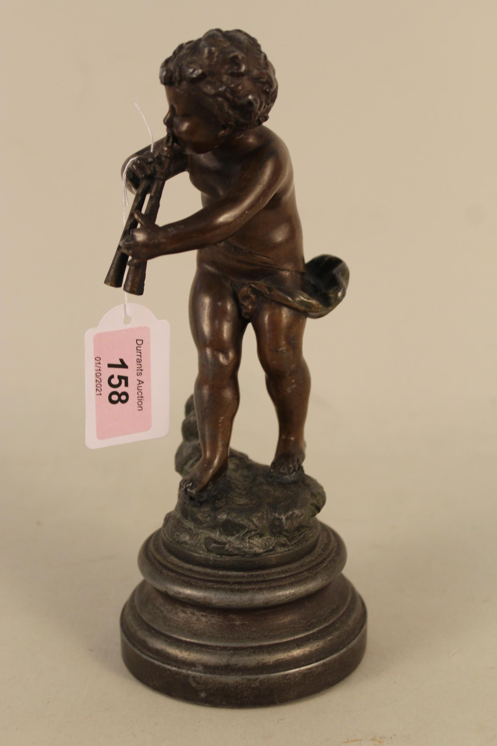 A vintage bronze figurine of Pan playing flute, marked France to base, mounted on a spelter base, - Image 3 of 3