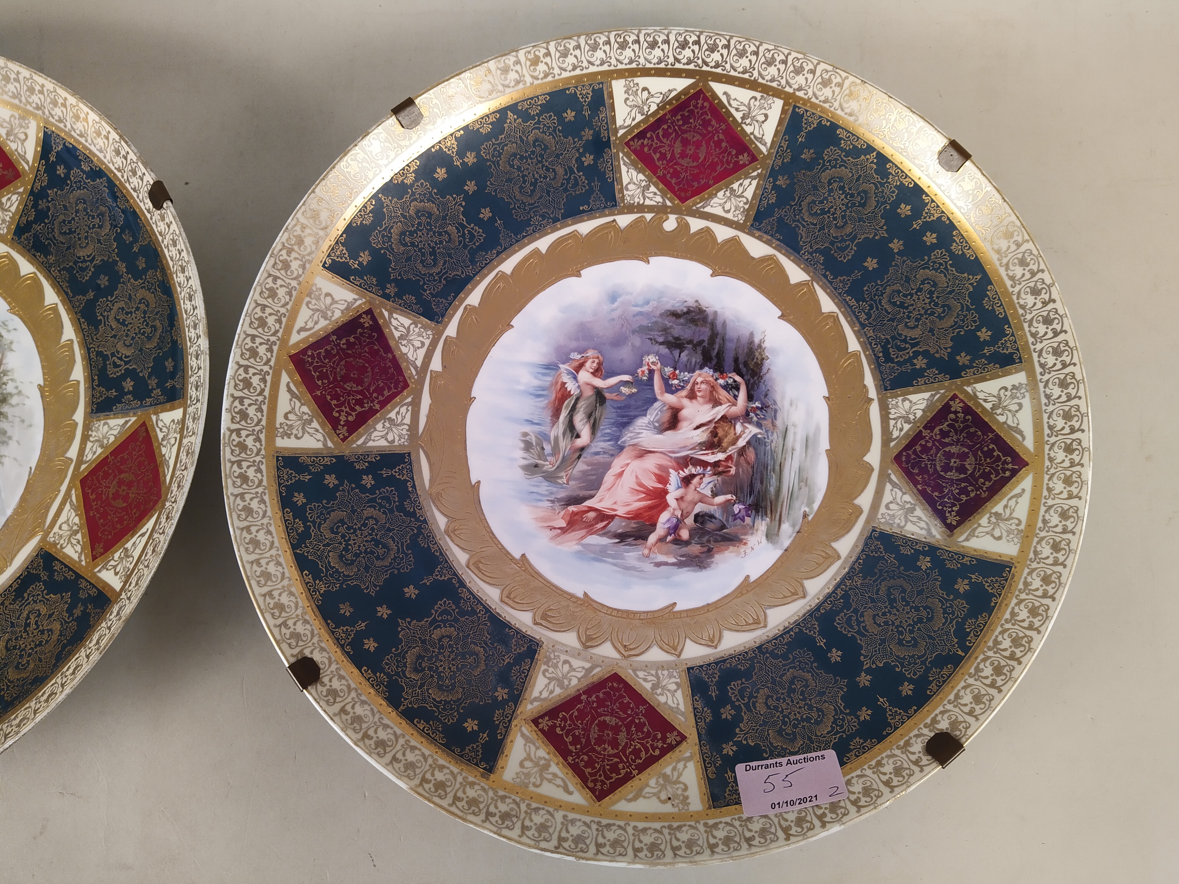 A pair of late 19th Century Schierholz porcelain dishes heavily gilded with central hand painted - Image 3 of 4