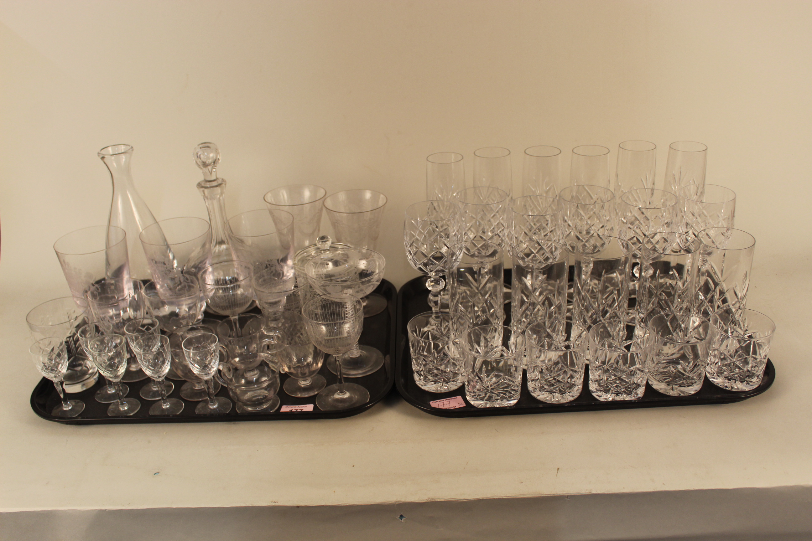 A large quantity of assorted glassware including cut glass hock and wine glasses,