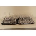 A large quantity of assorted glassware including cut glass hock and wine glasses,