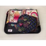 A vintage beaded lady's bag, together with two vintage hand sewn panels with pockets,