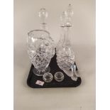 A fine cut glass lemonade jug, three decanters with stoppers,