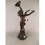 After August Moreau a patinated spelter figure of Cupid,