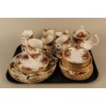 Royal Albert Old Country Roses tea wares including a teapot and a three tier cake stand