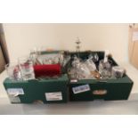 Two boxes of mixed glassware including drinking glasses from various airlines