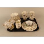 A vintage Staffordshire crinoline lady tea set including teapot and six settings etc together with