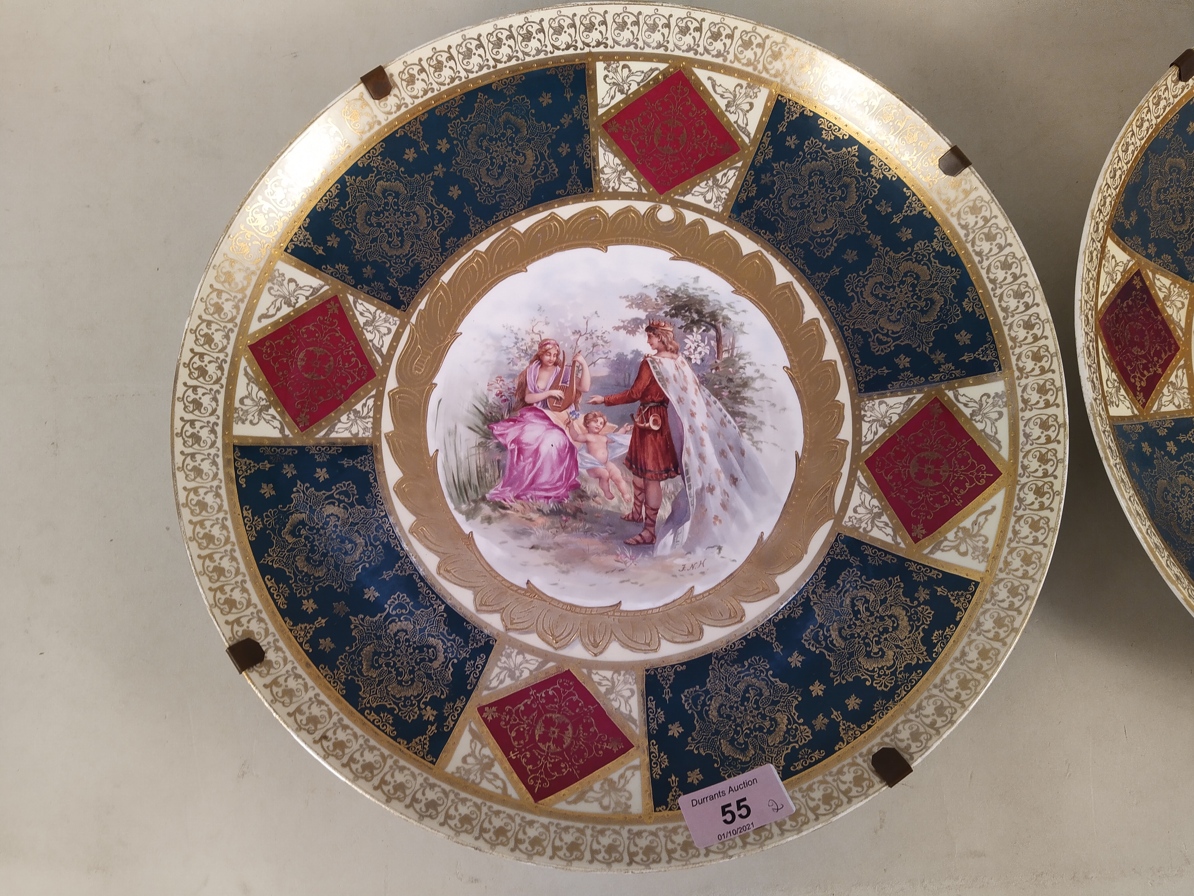 A pair of late 19th Century Schierholz porcelain dishes heavily gilded with central hand painted - Image 2 of 4