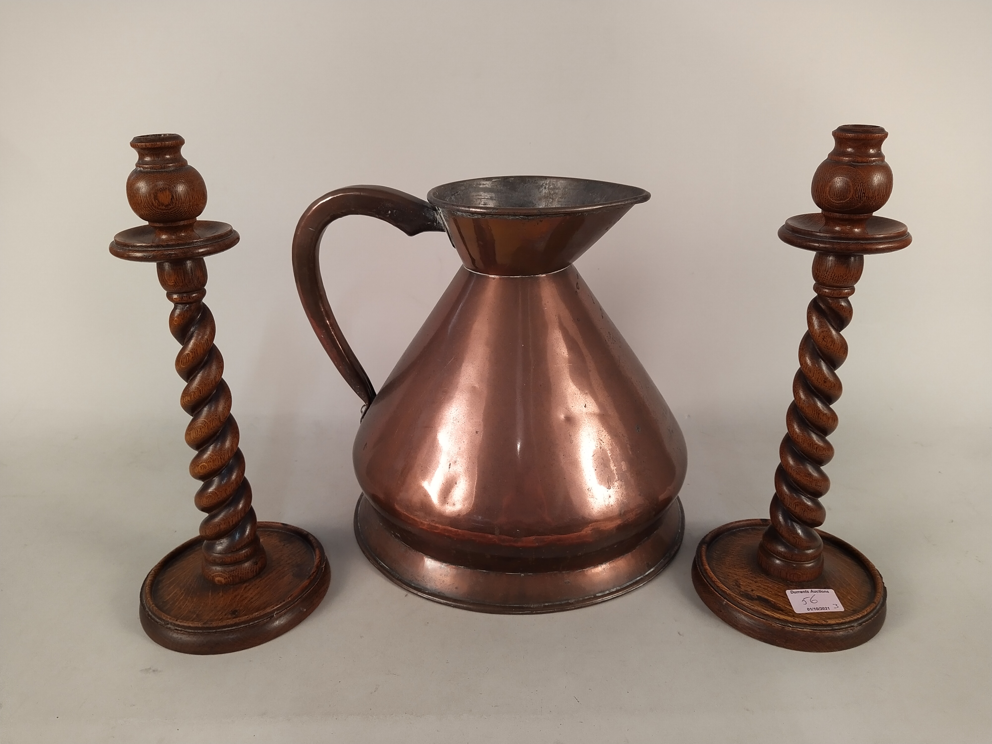 A pair of 1920's oak barley twist candlesticks, a copper jug stamped "2 gallons V.R. - Image 3 of 3
