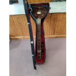 A cased vintage Indian sitar in the Ravi Shankar style with two sound boxes and extensive