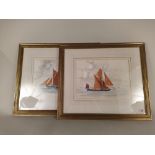 A pair of framed watercolours of fishing smacks,