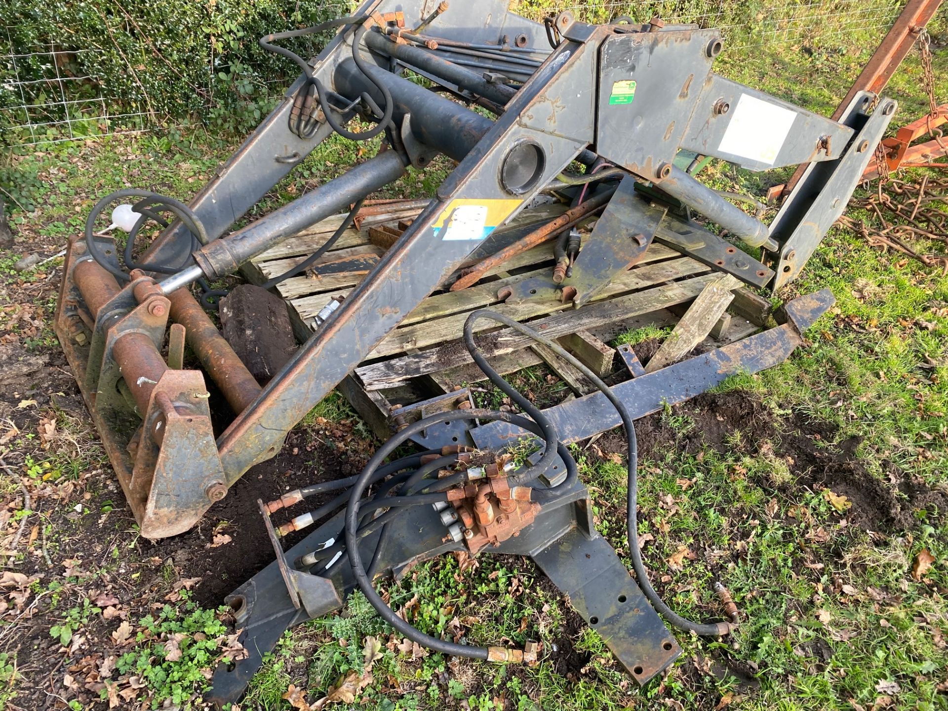 Quicky loader with brackets. Stored near Goring Heath, Reading. No VAT on this lot.