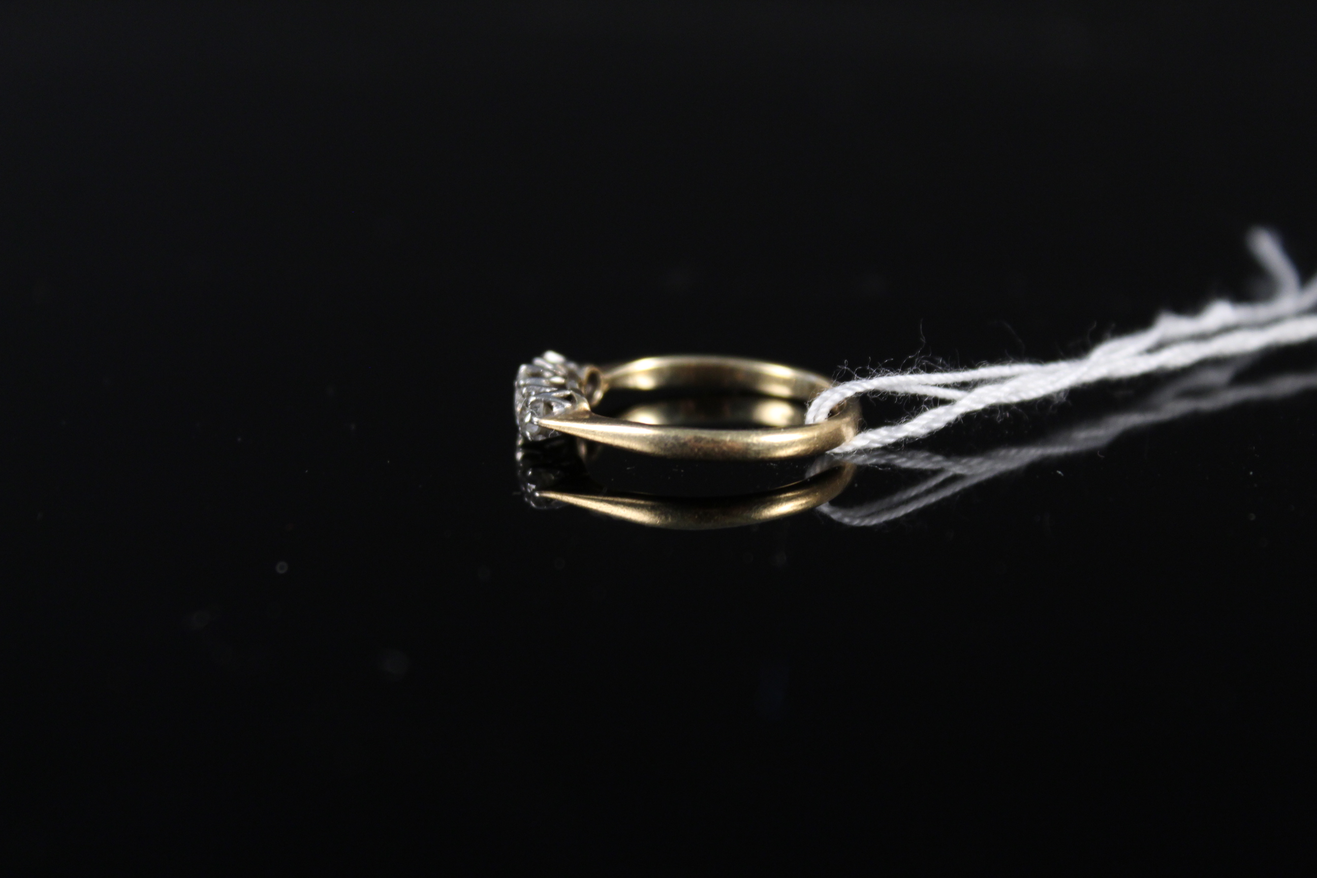 An 18ct platinum set three stone diamond ring, size J 1/2, - Image 2 of 3