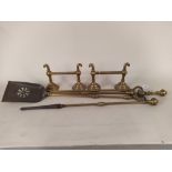 A heavy set of three 19th Century brass and iron fire irons,