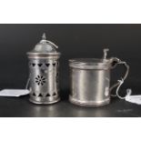 A silver drum mustard, hallmarked London 1936 plus a pierced silver pepper,
