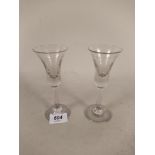 A pair of late 18th/early 19th Century Dutch engraved drinking glasses,