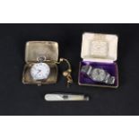 A mixed lot including a silver cigarette case with foliate details, silver bladed fruit knife,