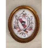 An early 19th Century oval gilt framed watercolour of the Coat of Arms on the Abington family of