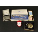 A mixed lot including a small silver cigarette case, costume jewellery, Estee Lauder compact etc,
