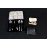 A set of six silver teaspoons, a silver cigarette case plus a pair of cufflinks,