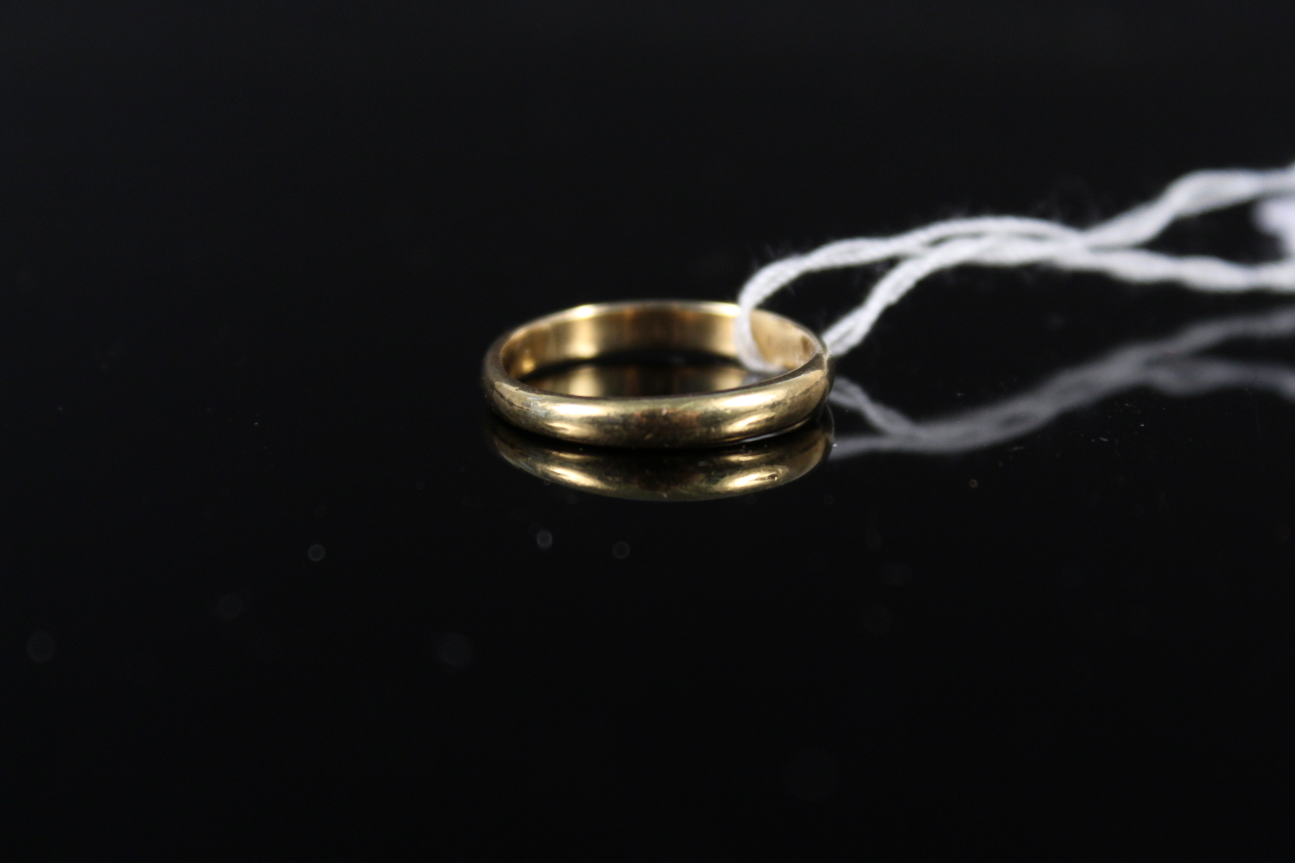 A 22ct gold band ring, size M, weight approx 3.