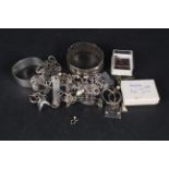 A mixed lot of silver and white metal jewellery including bangles, bracelets, earrings,