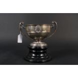 A silver twin handled trophy with presentation inscription, hallmarked London 1903,