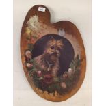 A late 19th Century mahogany artists palette with an oil portrait of a terrier on a floral border