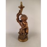 A gilded plaster cherub lamp base,