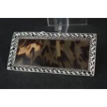 A rectangular silver and tortoiseshell pin tray,