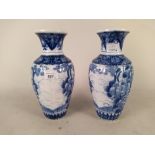 A pair of late 19th Century Chinese porcelain blue and white vases