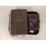 A small Victorian leather bound photograph album,