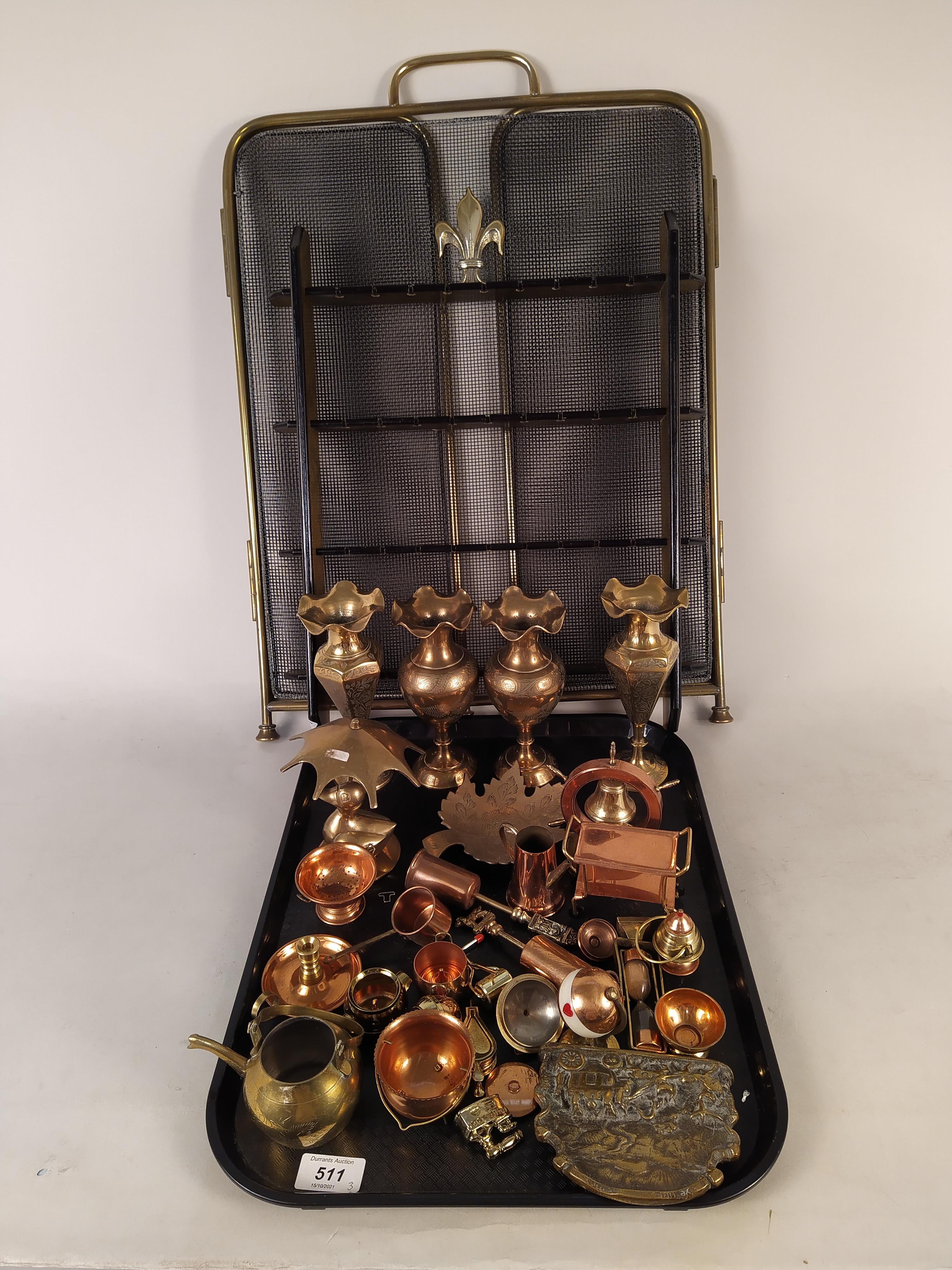 A folding brass fire screen, a spoon collectors rack,