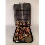 A folding brass fire screen, a spoon collectors rack,