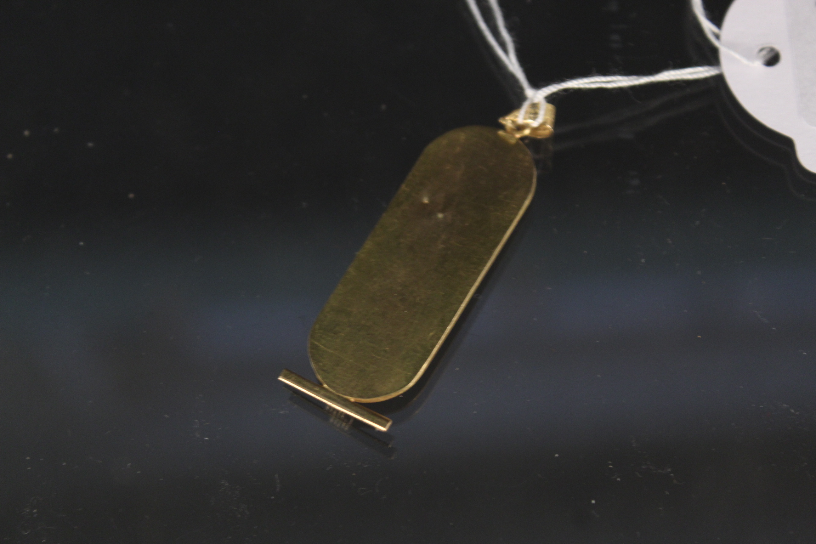 An Egyptian high carat gold pendant, weight approx 4. - Image 2 of 3