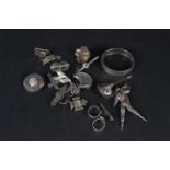 A mixed lot of silver and white metal jewellery including brooches, bangle,