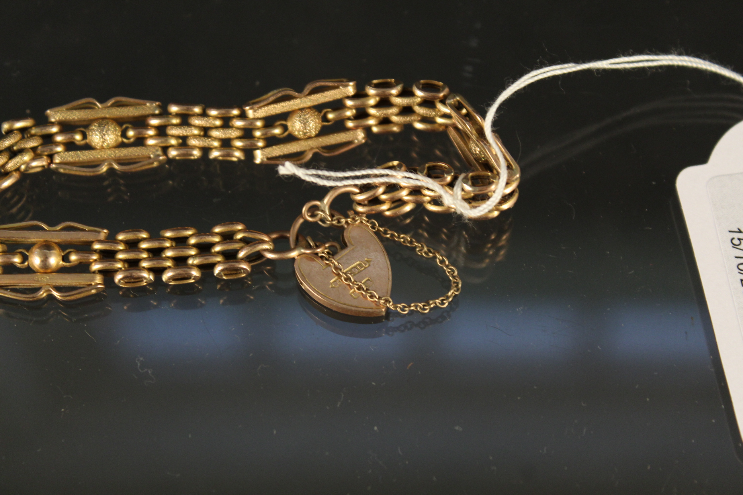 A 9ct gold bracelet with heart shaped padlock clasp, weight approx 10. - Image 2 of 3