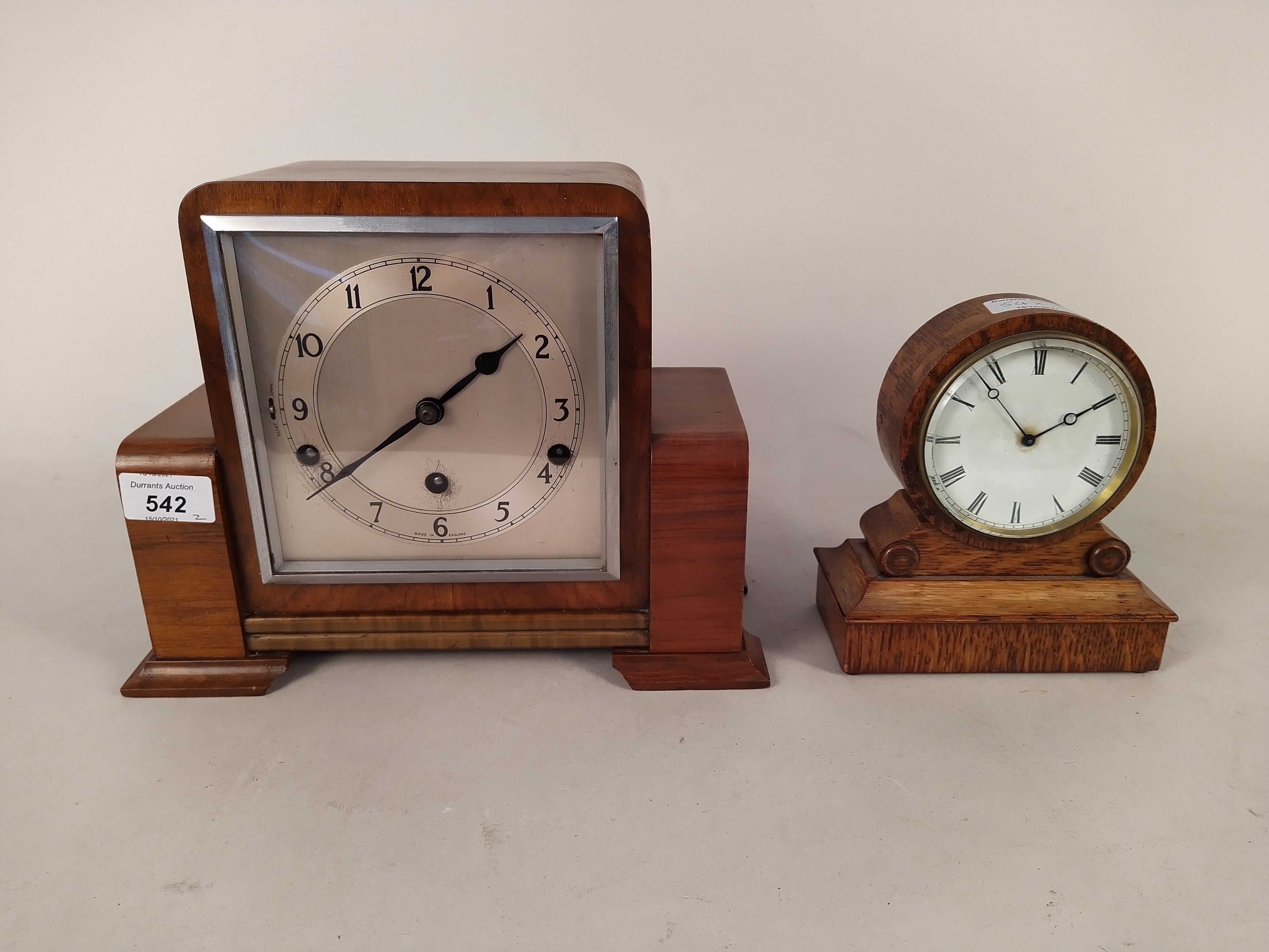 A late 19th Century oak framed mantel clock plus an Art Deco walnut striking/chiming mantel clock