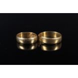 Two 22ct gold wedding bands (one cut),