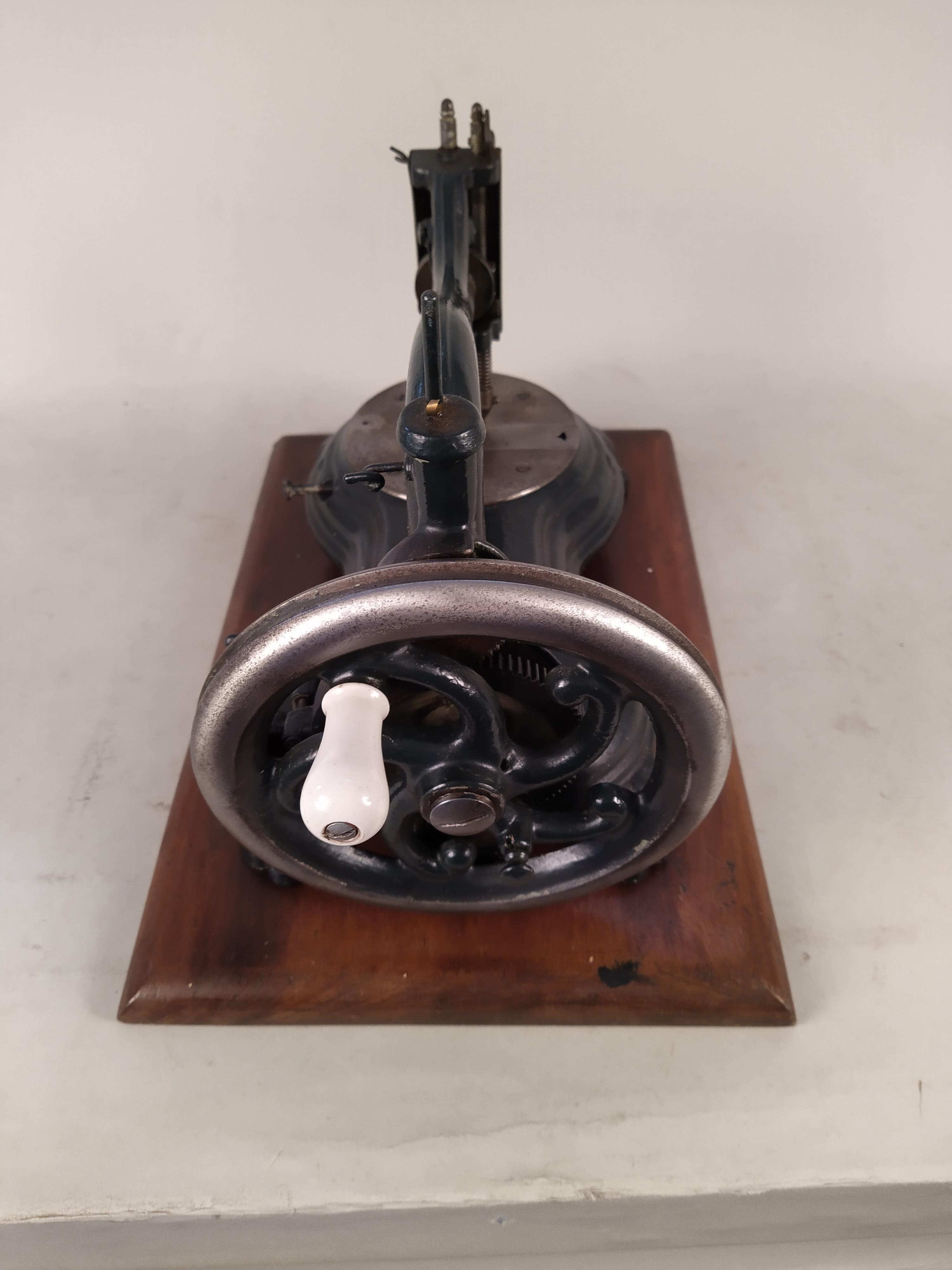 A late 19th Century sewing machine by P Jones - Image 2 of 3