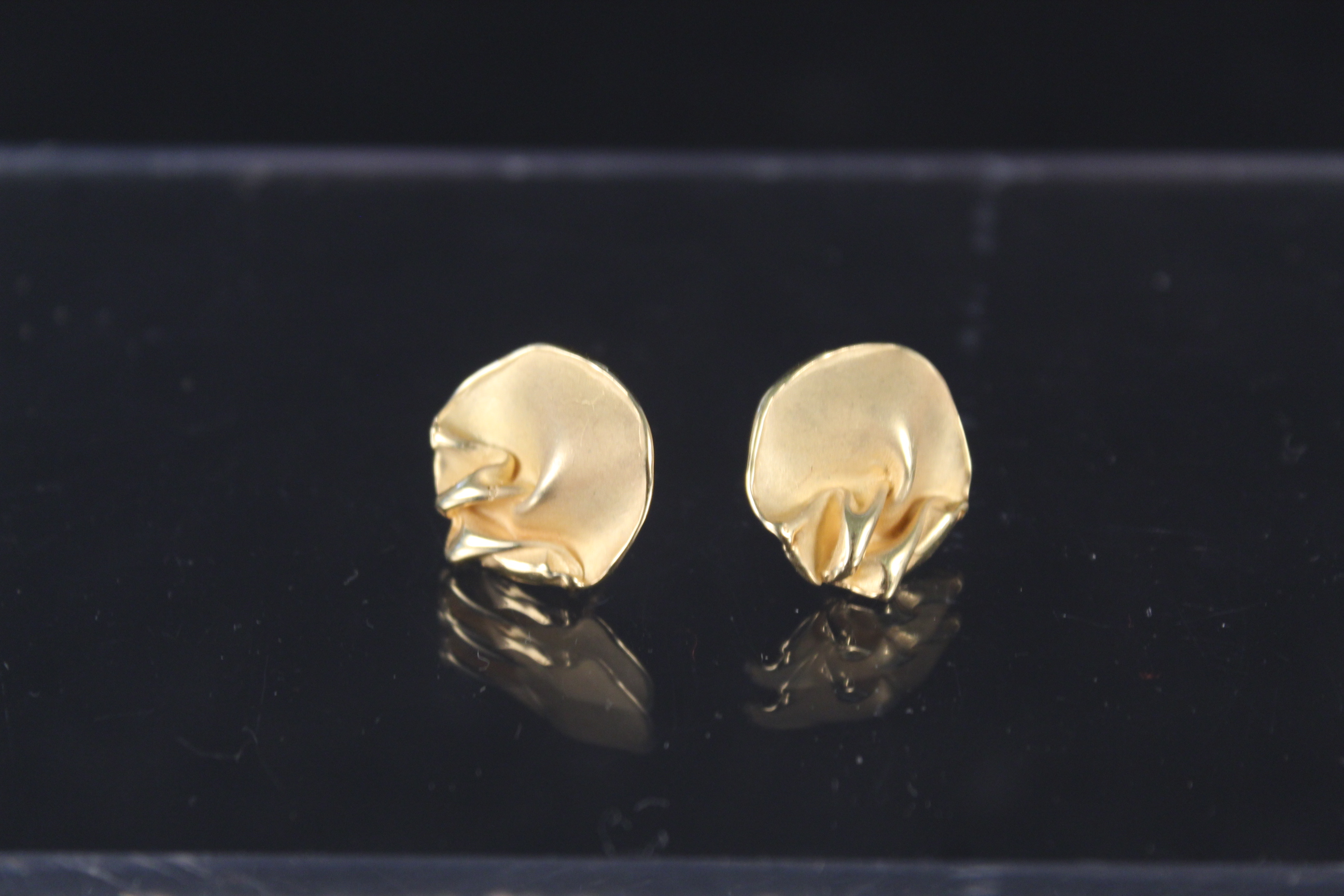 A pair of unusual 9ct gold abstract form earrings, weight approx 4.