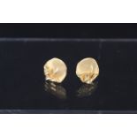 A pair of unusual 9ct gold abstract form earrings, weight approx 4.