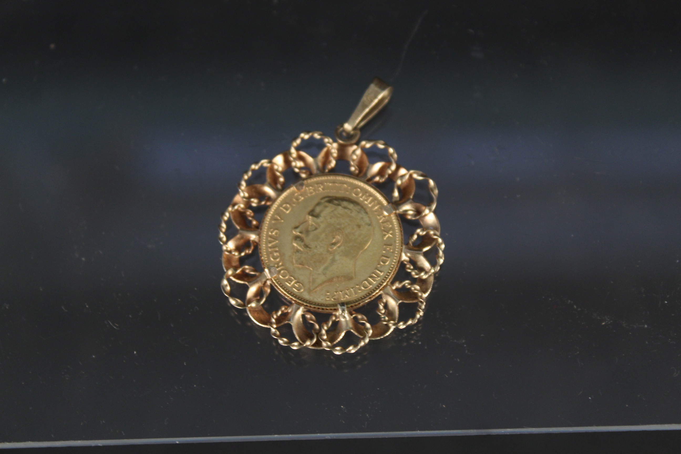 A 1913 half sovereign in 9ct gold pendant mount, - Image 2 of 3